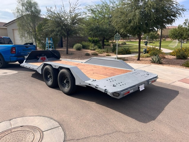 RawMaxx SLX 18' car hauler with blue Ram truck